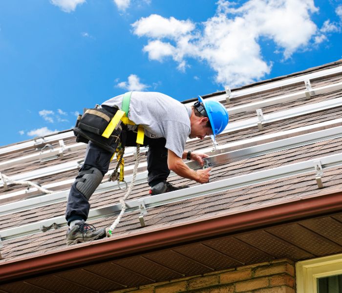 Florida solar installer working on solar racking